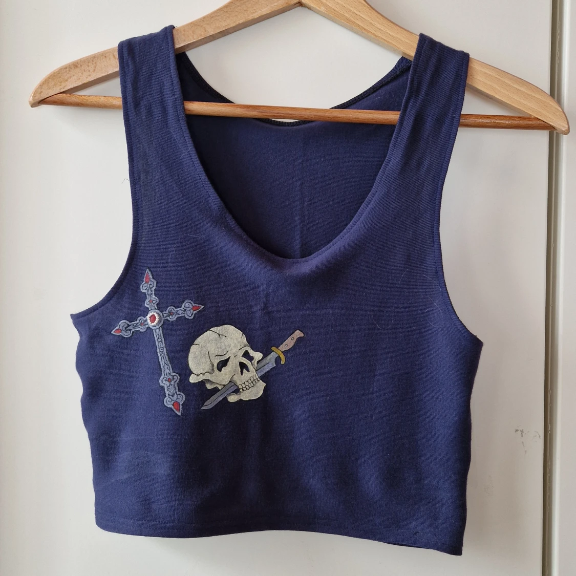 Topp med skalle och kors