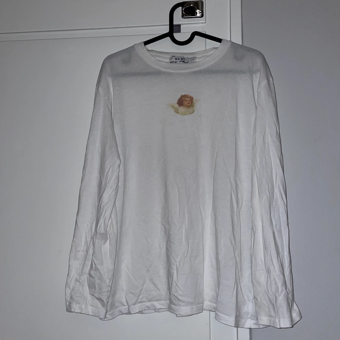 Vit långärmad tröja