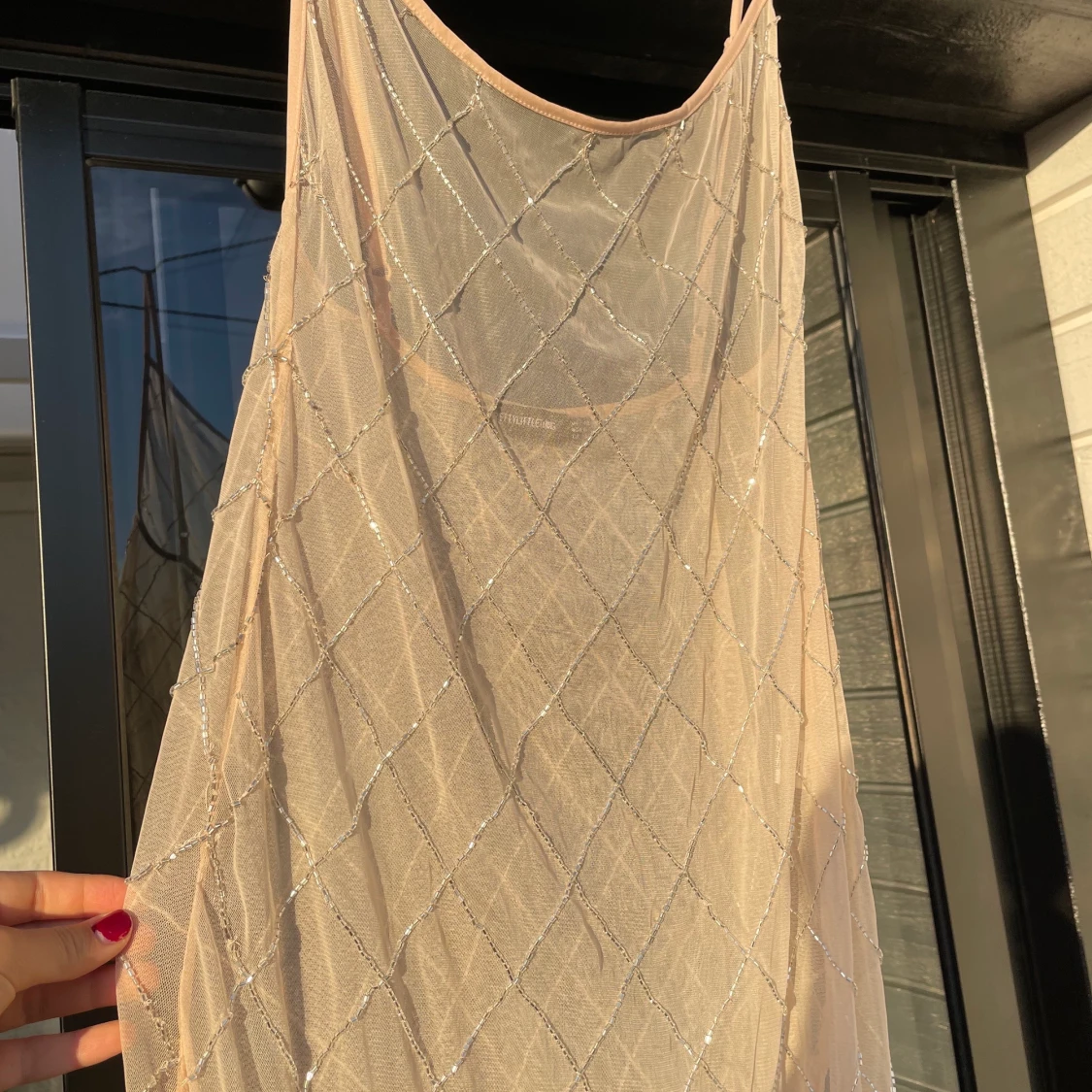 Transparent klänning med glitter  - 90