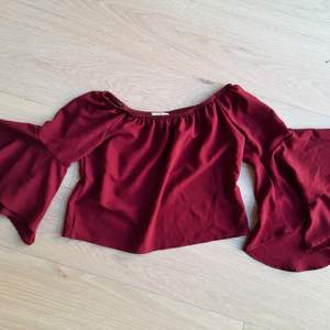 Dark red over-the-shoulder shirt with wide sleeves. Great condition, size S. 