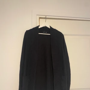 Svart kofta - Svart kofta