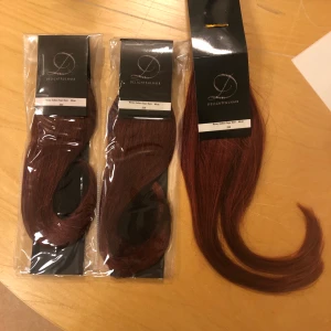 Löshår - Tre paket löshår med hårfärgen rödbrun. Betalde 2000 men säljer för 1300. Helt oanvänt.