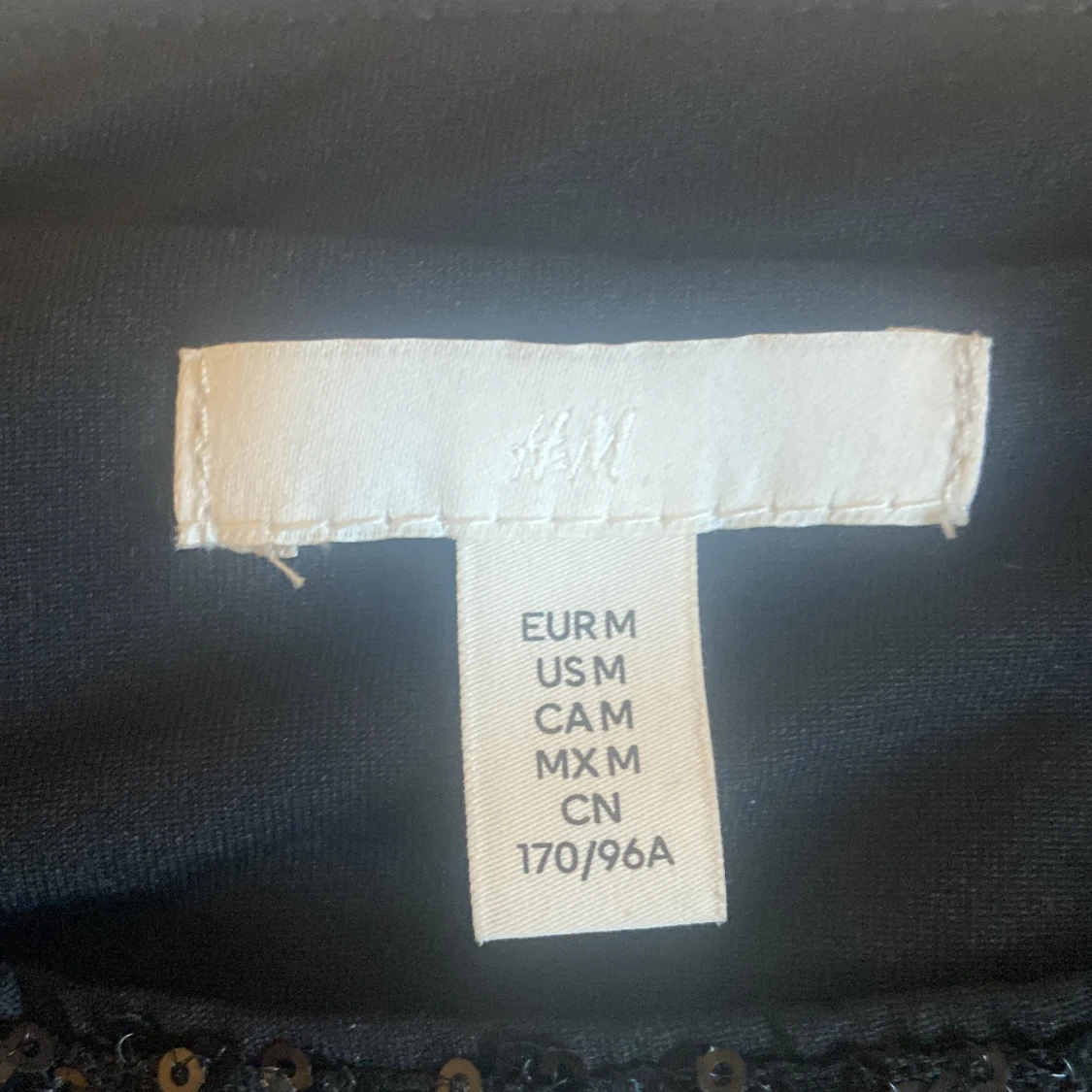 Svartglittrig topp från hm - 91