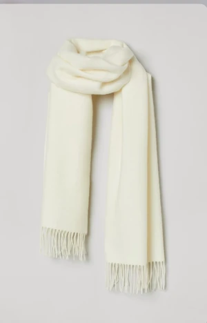 Vit sjal - Vit sjal från hm ingen fläck eller nånting den är helt ny. 