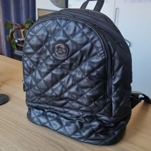 Ryggsäck, liten  - Välanvänd men fint skick.