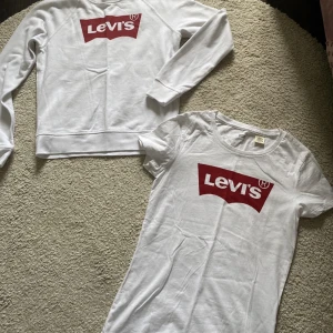 Levis klädpaket i fint skick! - 2 märkeströjor från Levi’s, en T-shirt i storlek s och en sweatshirt i storlek xs   Knappt använda men i fint skick, inga tydliga defekter !