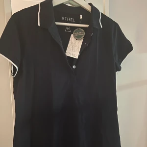 Pikétröja oanvänd  - Fin oanvänd pikétröja med lapp kvar