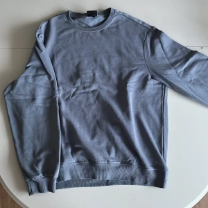 Mys tröja - Sparsamt använd härlig myströja från H&M. Fin grå/blå färg.