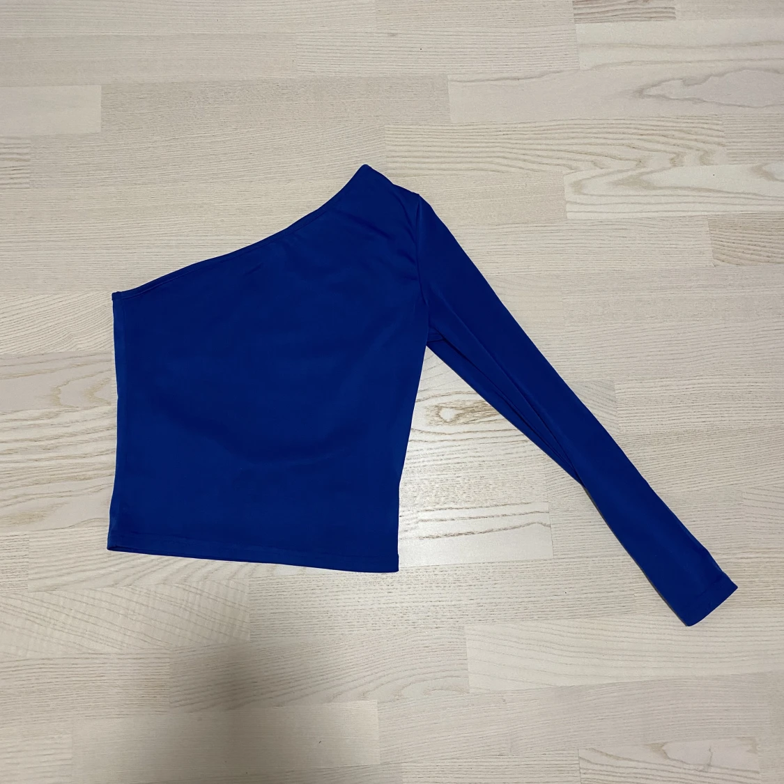 En ärmad blå tröja