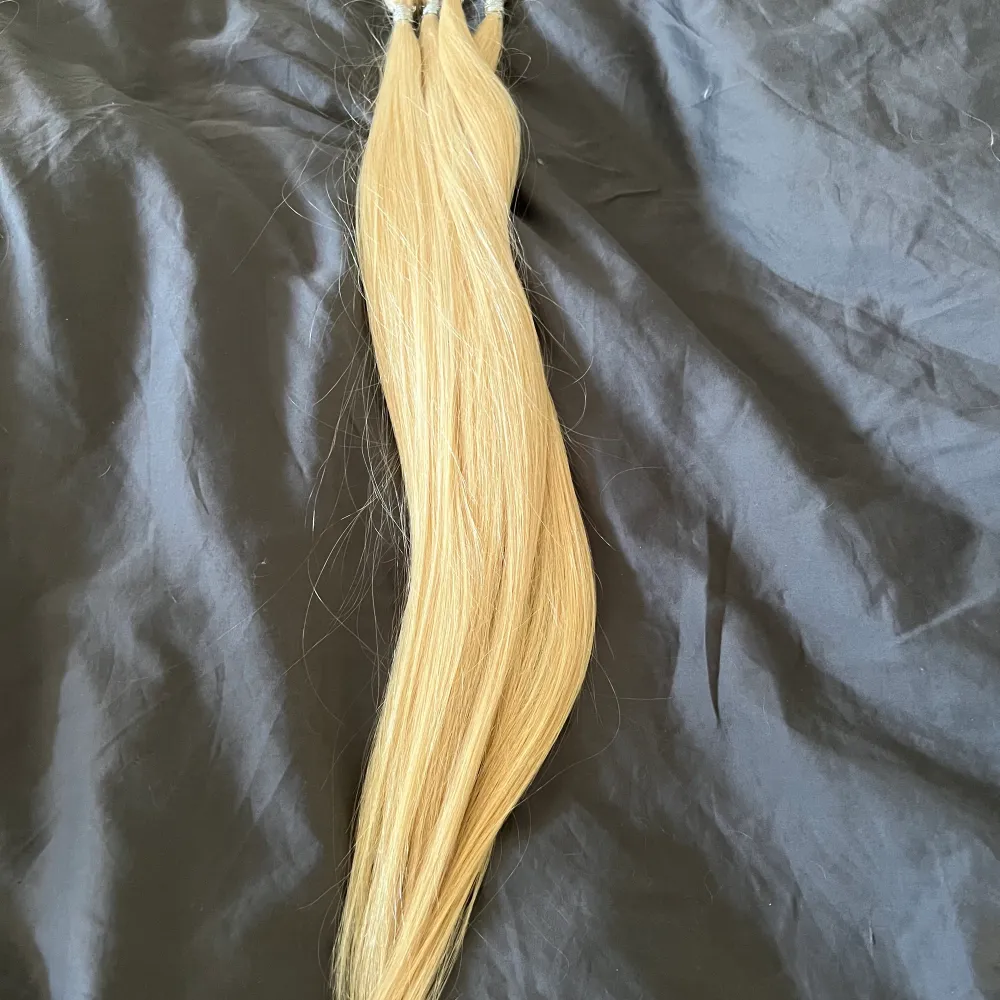 100slingor färg 613 50-55 cm långt 1 grams slingor hår som inte trasslar sig . Övrigt.