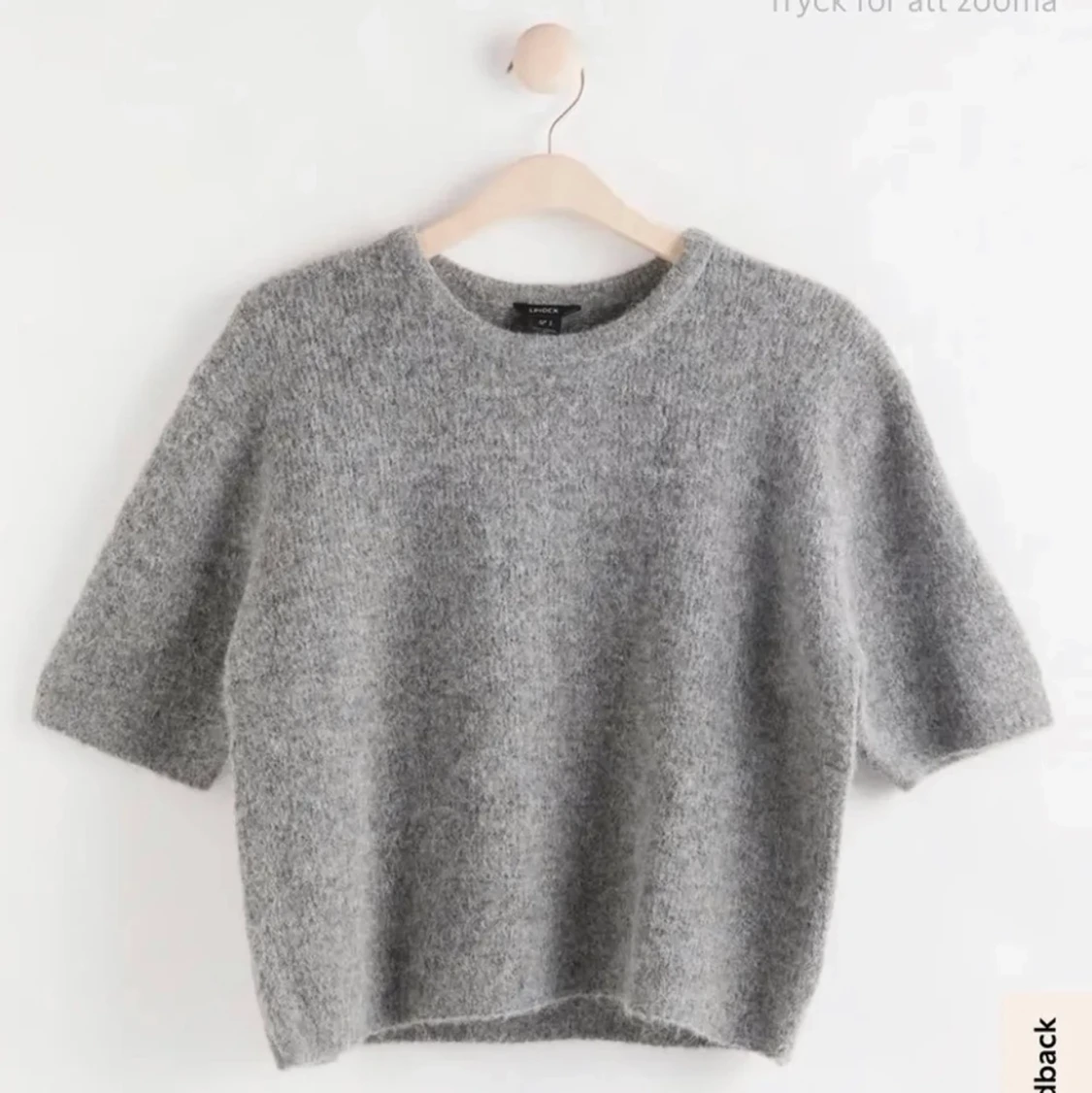 Grå stickad tröja