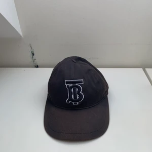 Burberry keps - Svart burberry keps, cond:6/10 pga att den är lite solblekt