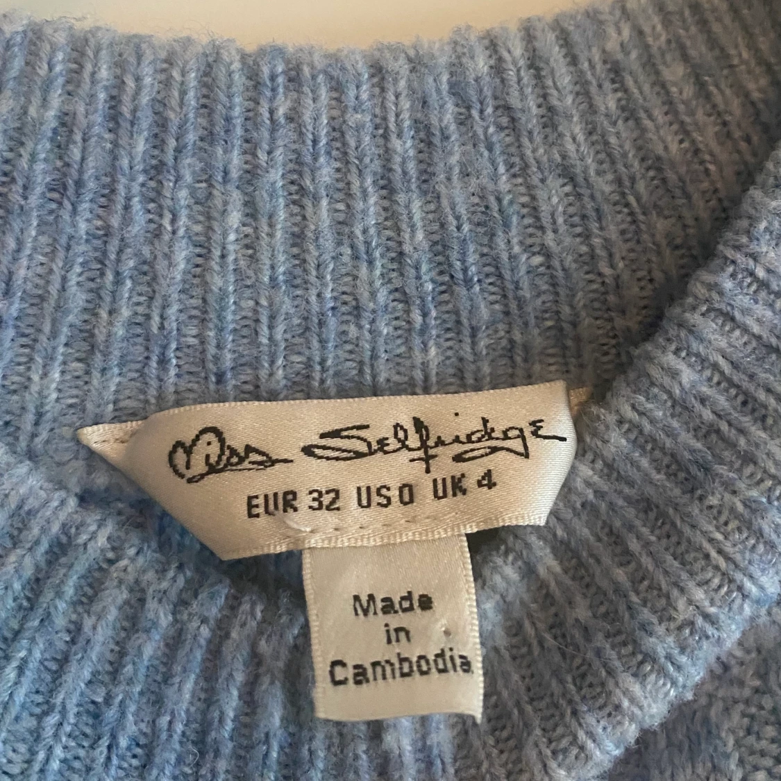 Ljusblå stickad tröja - 91