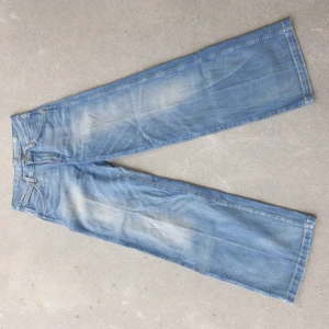Vintage Brand New Wrangler Farrah - real vintage lightwash Wrangler waist 26 length 32 flare jeans Brand new without tags, small hole in leg but hardly noticeable 