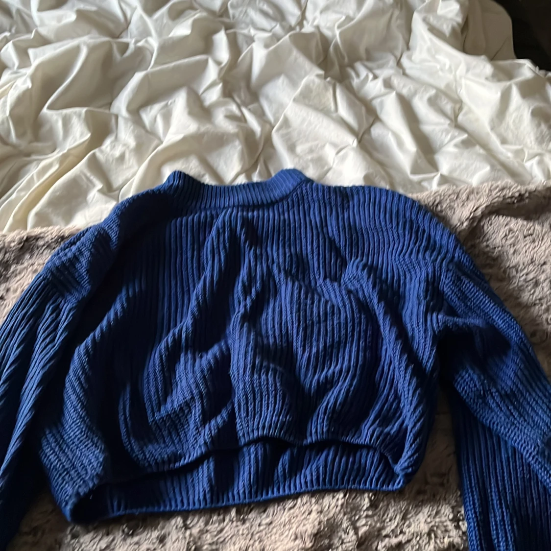 Blå tjocktröja 
