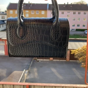 Svart handväska - Svart liten handväska