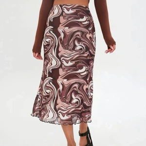 Brun midaxi kjol - Har ej använts och är bra skicka 