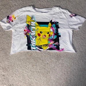 crop top pokemon - This is a childs t-shirt that i cropped myself. It fits like a small/ x small crop top in a womens section. 