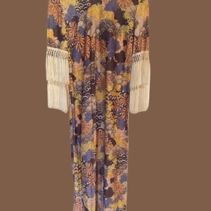 Retroklänning - Så cool retroklänning med snygga detaljer på ärmarna