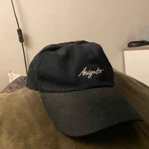 Axel Arigato Keps - Svart Arigato keps. Knappt använd.