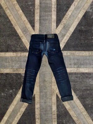 Raw denim selvedge jeans från Naked & Famous - Säljer ett par sällsynta selvedge jeans ifrån Naked & Famous i storlek 31 med sjukt feta fades. För att få mer information är det bara att skriva!