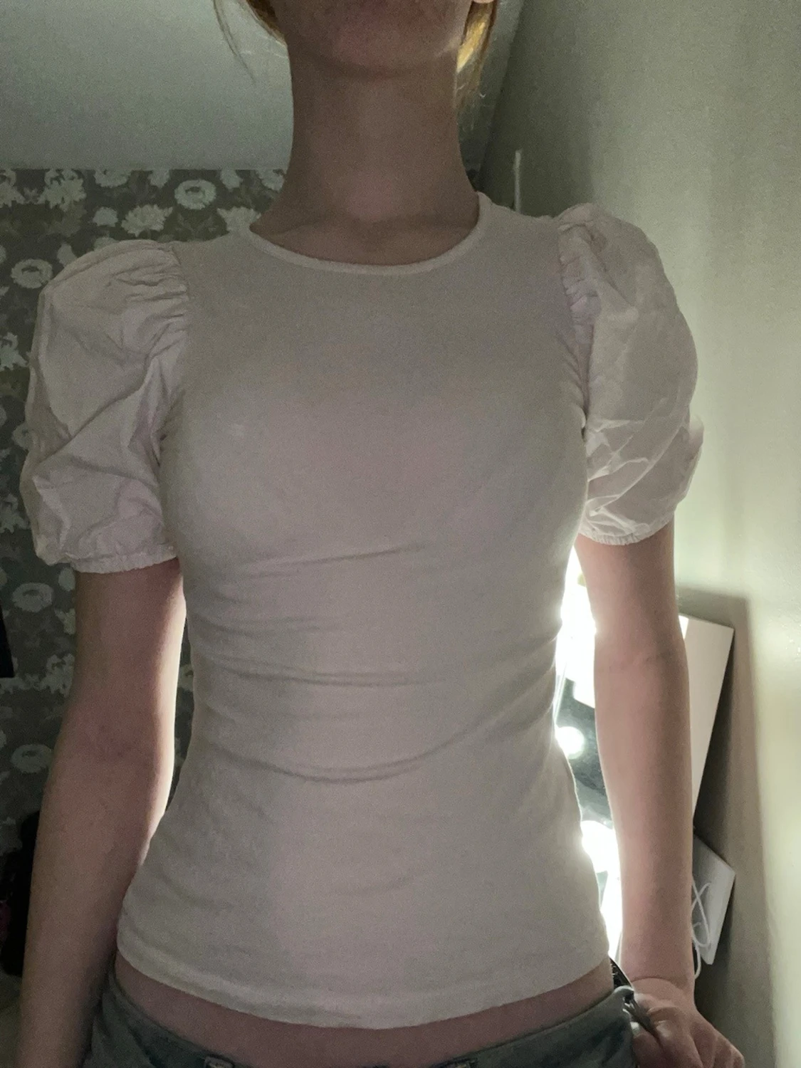 Ljusrosa topp med puffärmar