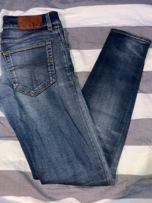Tiger of Sweden Jeans - Bra skick, använda en del. Kan diskutera pris och skicka fler bilder om det önskas.