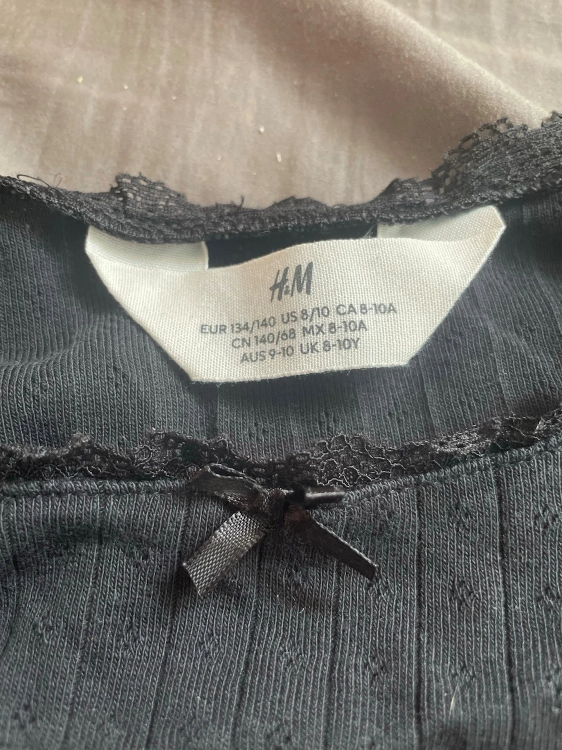 Svart ribbad blus från H&M - 1