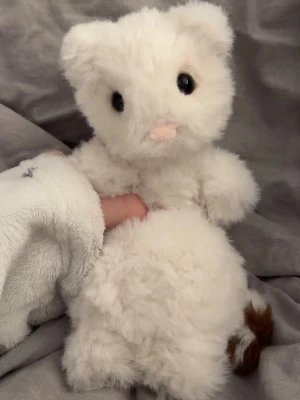 Virkad hermelin  - Super gullig virkad hermelin med vikt och virkad med pälsgarn💕