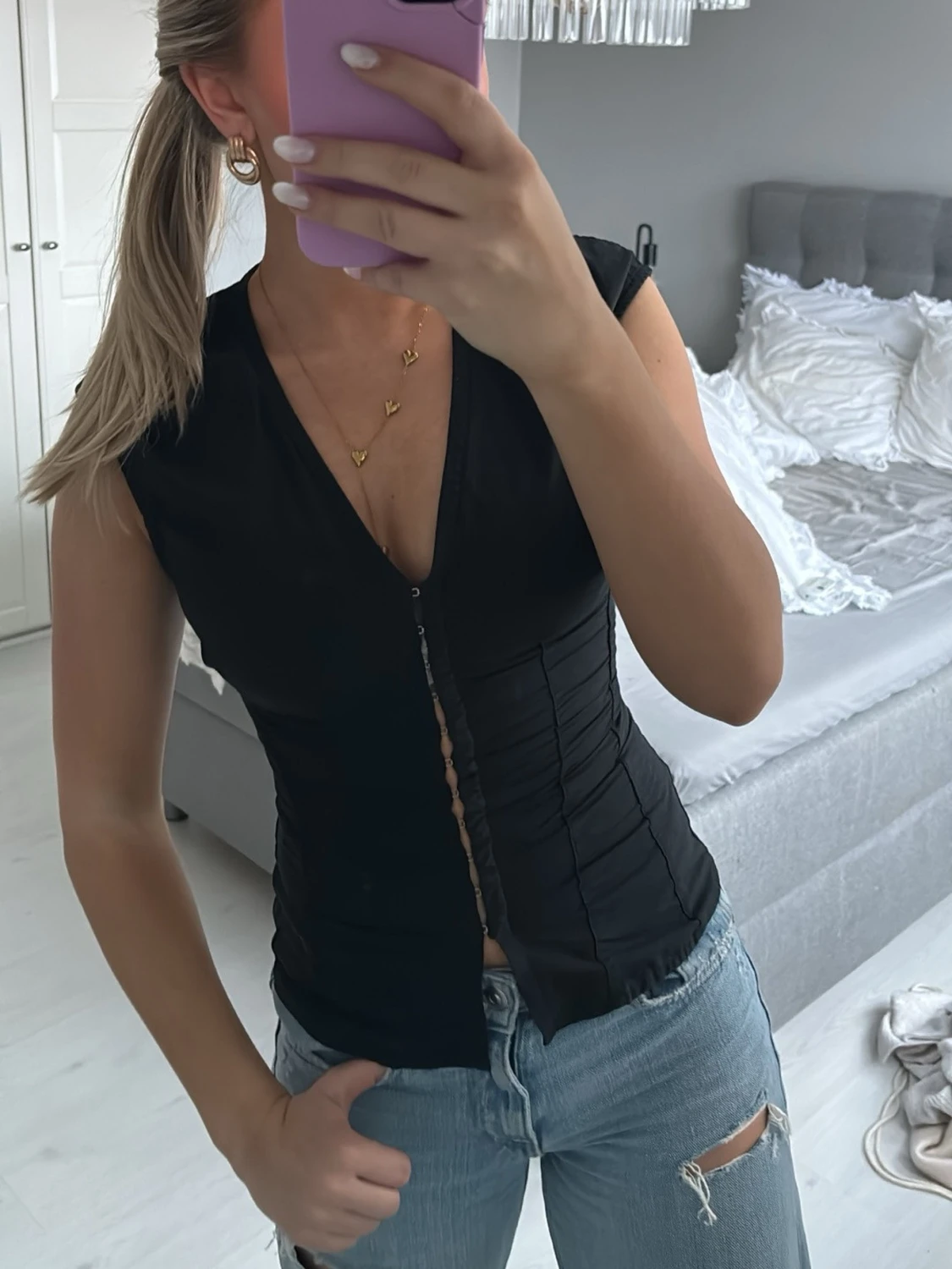 Svart topp med uringning från Weekday