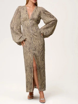 Adoore klänning - Säljer min fantastiska zebra-adoore klänning, väl använd men ändå i fint skick!! 🤎