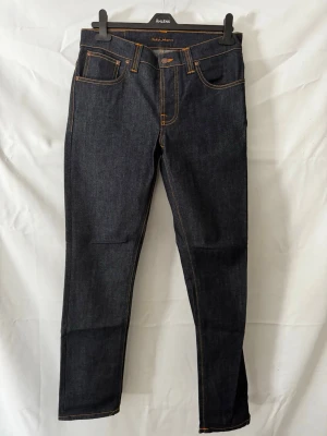 Nudie Jeans  - Snygg mörkblåa jeans från nudie jeans skjorta  | Kanon skick