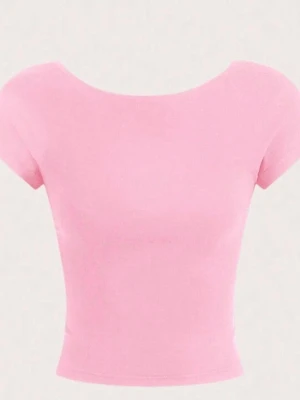 Snygg rosa tröja med öppen rygg - Säljer den pga av att den är för liten och att den inte kommer till användning.