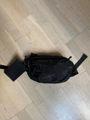 Arc’teryx Arro Waist Pack - Arct’eryx fanny pack / bältesväska Model: Arro Waist Pack Black Brand new, never used with tags