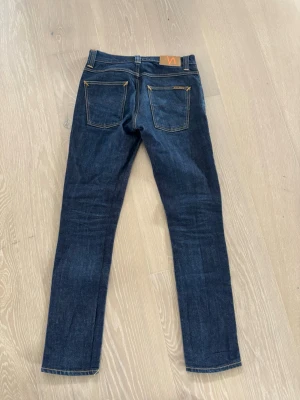 Nudie jeans grim tim - Säljer dessa snygga nudie jeansen i den populära modellen grim tim, storlek W 30, L32! De är i utmärkt skick, inga defekter. Hör gärna av dig vid funderingar😊