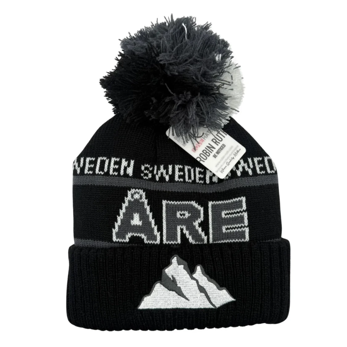 Svart mössa med tofs och Åre-tryck