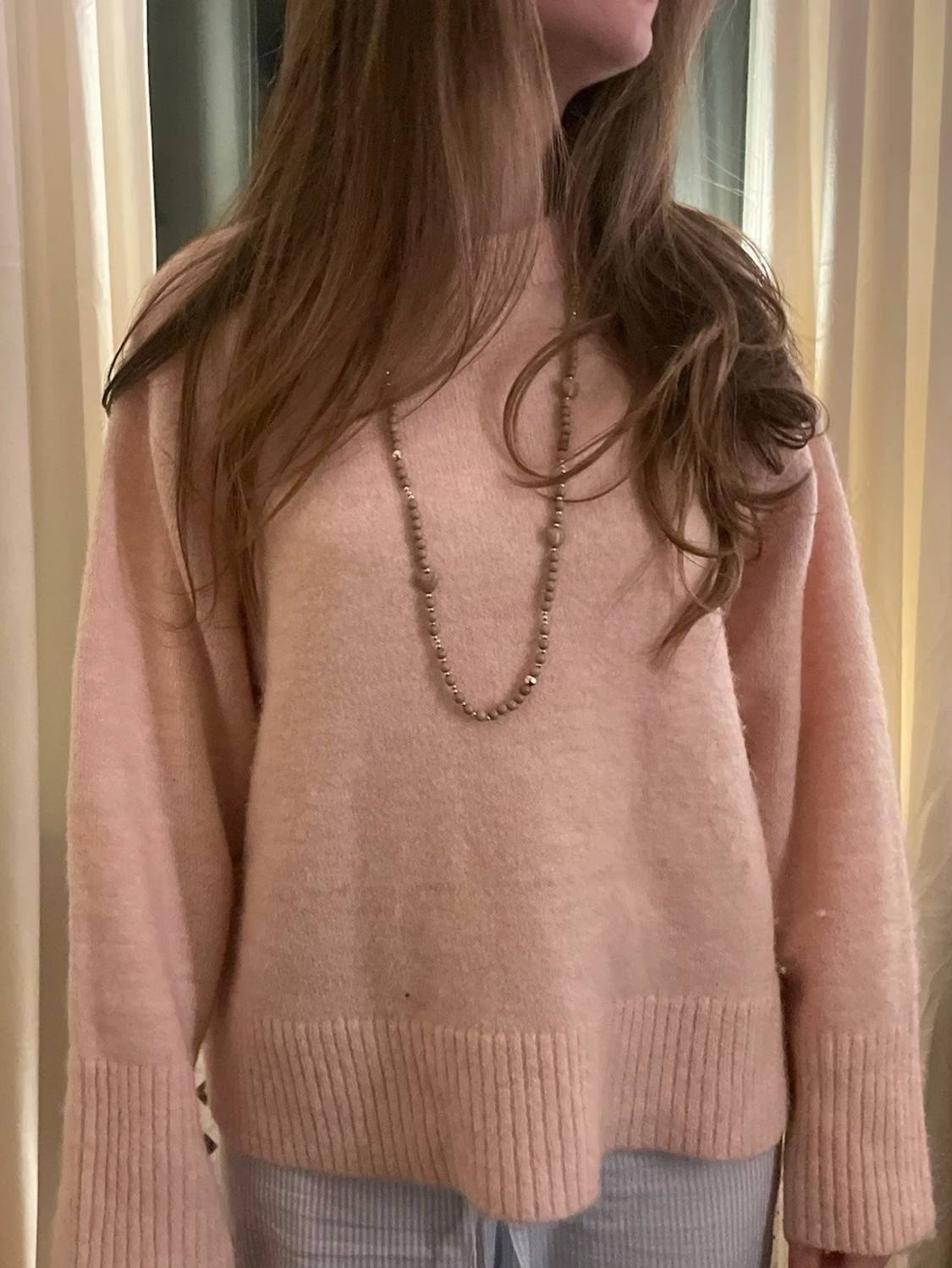 Ljusrosa oversized stickad tröja