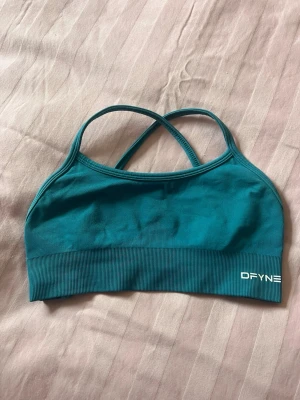 sport-bh från DFYNE - Snygg teal färgad sport-bh från DFYNE från dynamic serien, säljer då den tyvärr är för liten för mig 