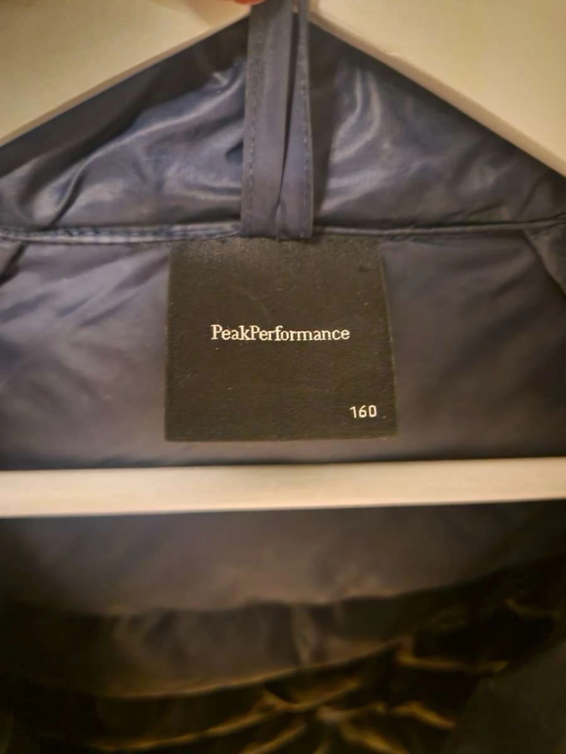 Mörkblå dunjacka Peak Performance