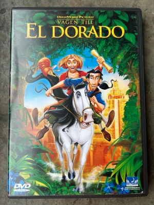 Vägen till El Dorado dvd - DVD-film med "Vägen till El Dorado". Filmen är från DreamWorks Pictures.Textning finns på engelska och svenska. Bildformatet är 1.85:1 Anamorphic Widescreen. Speltid är 1 timme och 29 minuter. Extramaterial inkluderar regissörskommentarer, borttagen scen, animationens grunder, musikvideo med Elton John, biotrailer och en 4-sidig bok med produktionsnotiser.  Finns på språk: Svenska, Engelska, Norska, Danska, Finska   OBS!! skivorna är begagnade så det kan förekomma repor/hairlines på skivorna
