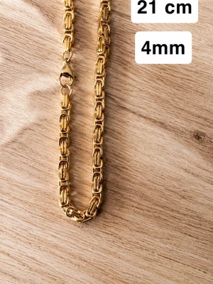Guldpläterat kedjearmband 21 cm - Snyggt guldpläterat kedjearmband. Armbandet är 21 cm långt och 4 mm brett, perfekt för dig som gillar stilrena accessoarer. 