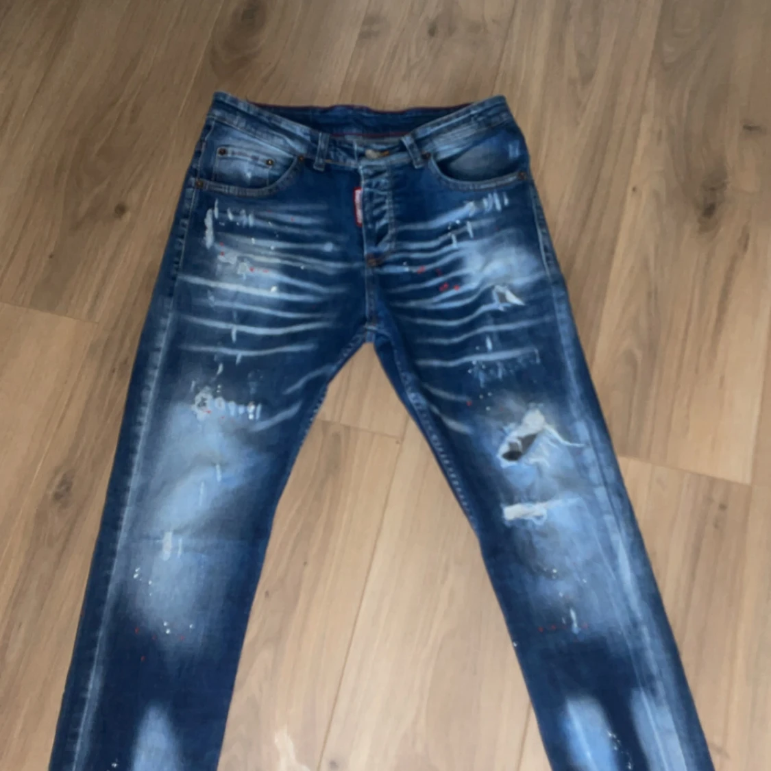Dsquared2 blå jeans med slitningar