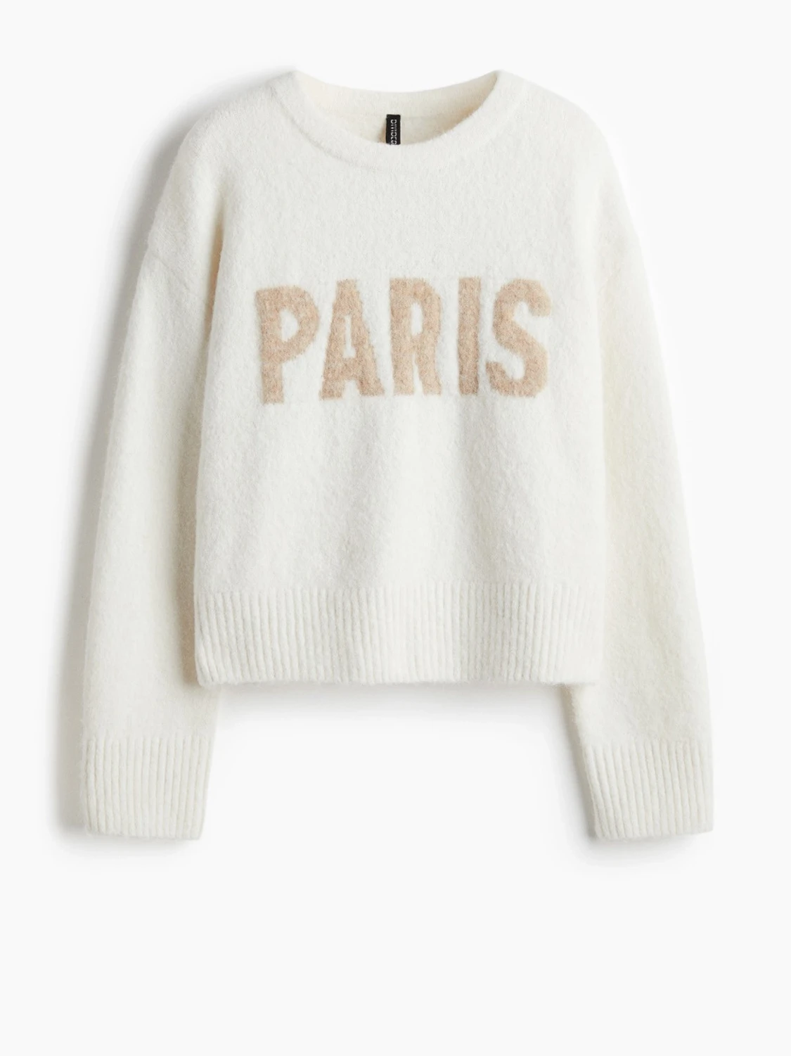 Vit stickad tröja med PARIS-tryck