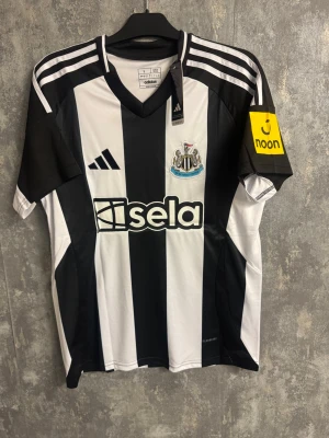 Newcastle Isak - Ny storlek L - Helt ny storlek L