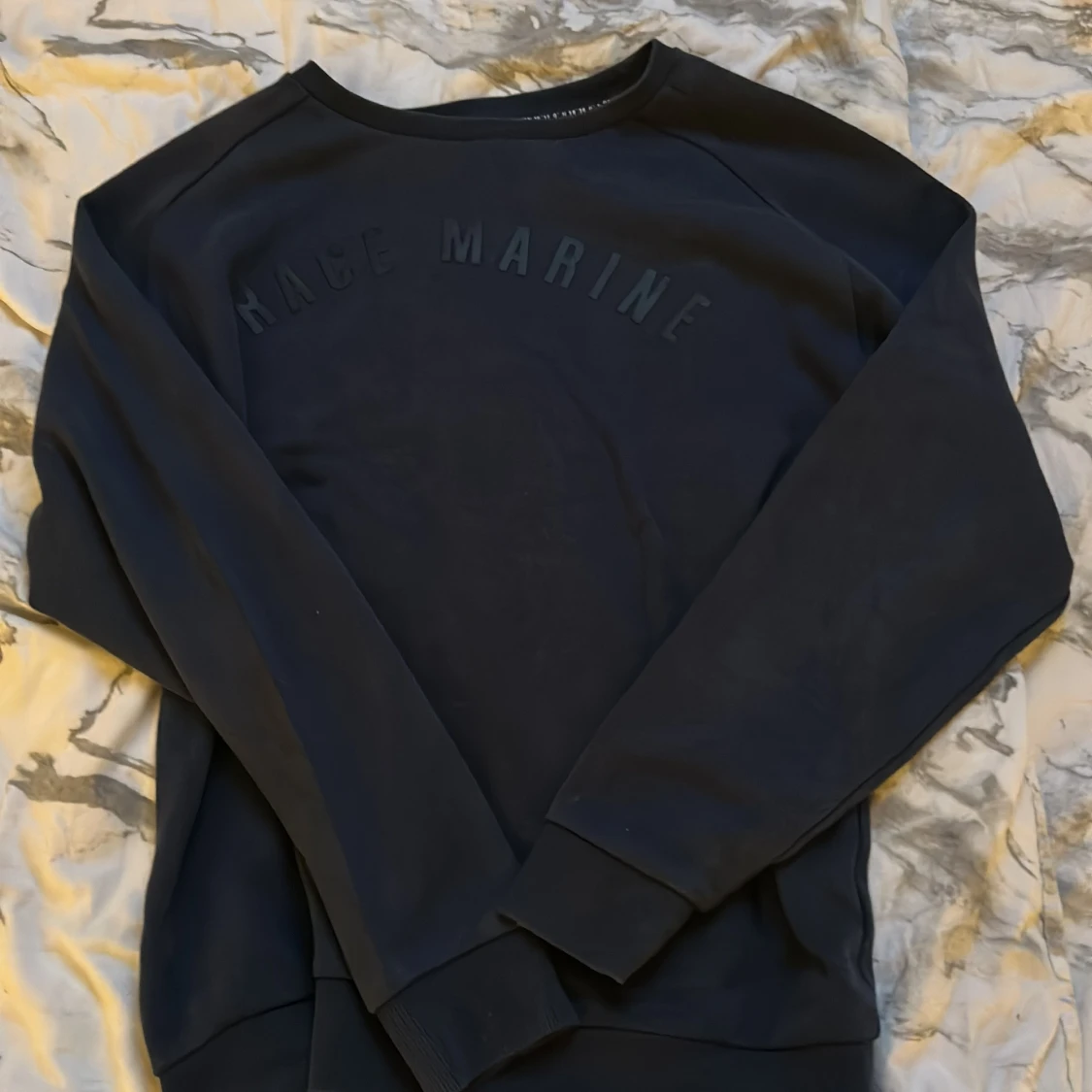 Mörkblå Race Marine