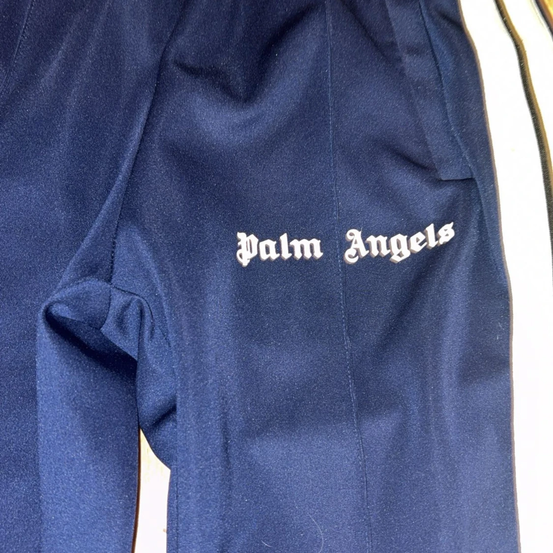 Palm Angels blåa trackpants med ränder