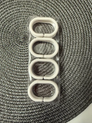 Duschdraperikrokar - Säljer 12st helt nya duschdraperikrokar.