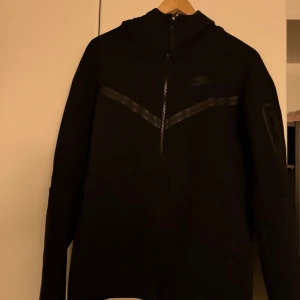 Nike tech  - Black nike tech hoodie in good condition no stains or holes 
