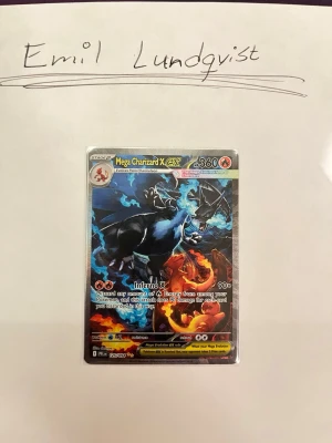 Mega charizard X ex phantasmal flame engelska  - Säljer en Mega charizard X ex phantasmal flame engelskt kort. Finns i Stockholm. Skickar inte.