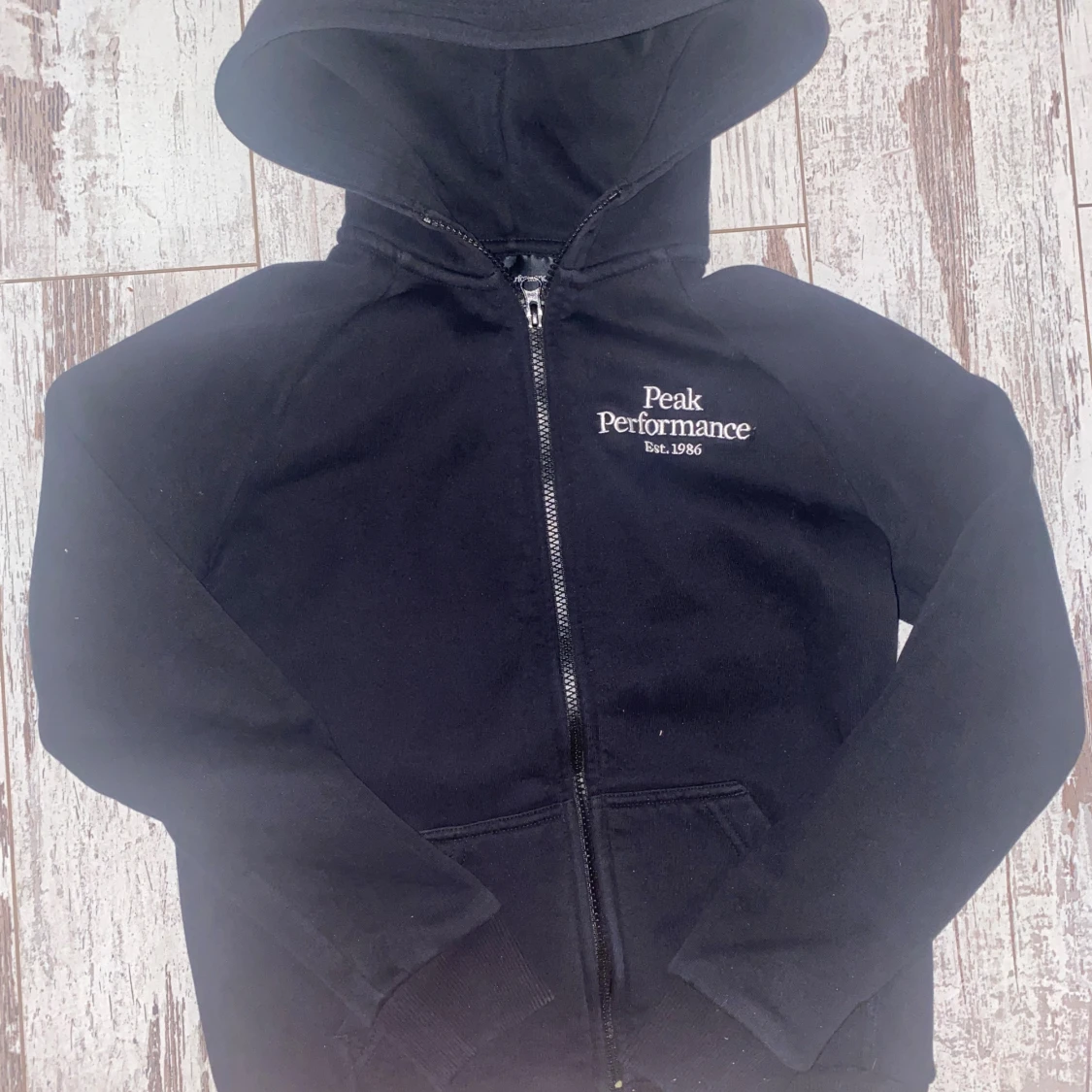 Svart hoodie Peak Performance XS - 4